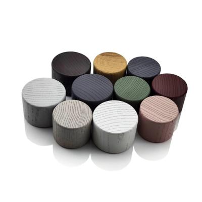 China Custom Made Wooden Perfume Caps With Uniform Texture And Soft Tones for sale