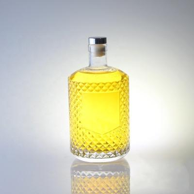 China 700ml Sophisticated Liquor Gin Bottle with GLASS Collar and Engraved Closure for sale