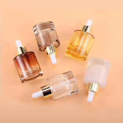 China Glass Cylinder Dropper Bottle 15ml  30ml 40ml And 50ml With White Cap Thickness Base for sale
