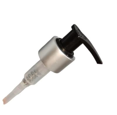 China Left-Right Lock Hand Press Dispenser Lotion Shampoo Cream Pump  with Silver Smooth Closure pumps en venta