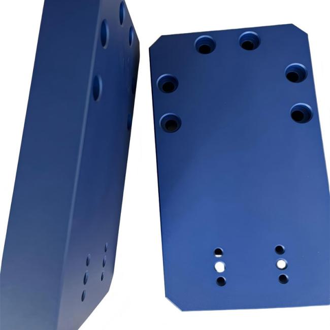 CNC milled bracket with blue oxidation surface finish