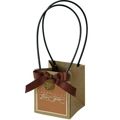 China Custom Logo Print Wholesale Grocery White Brown Kraft Paper Gift Bag Cute Craft Paper Bag With Handle for sale