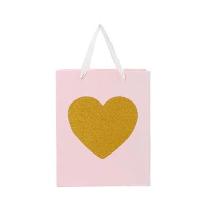 China Kraft Custom Printed Paper Bags 200-300gsm For Shopping Jewelry for sale