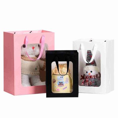 China FSC Gift Doll Kraft Floral Paper Bag With PVC Transparent Window for sale