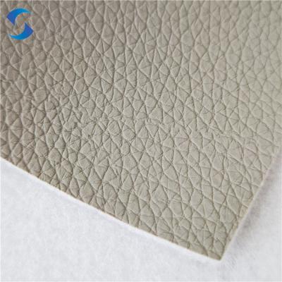 China Variedad de color Personalizar espesor Tejido de cuero falso tejido de cuero sintético para el asiento del coche en venta