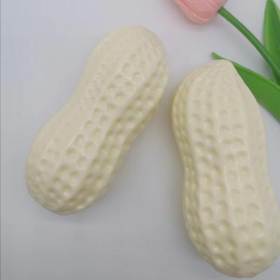 China Pet Chew Toy Grinding Teething Bite Squeaky Vinyl Material Milk Fragrance Peanut For Cats And Dogs for sale