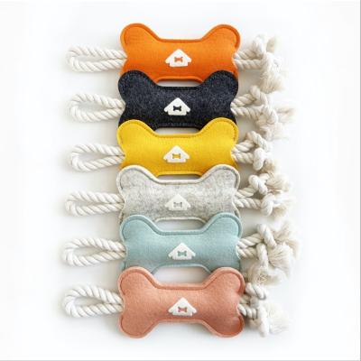 China Chewing Toy Felt Bone Shape Pet Tugboat Toy Rope for Small Dog for sale