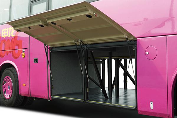 Rear view of the coach showing luggage compartments and rear design