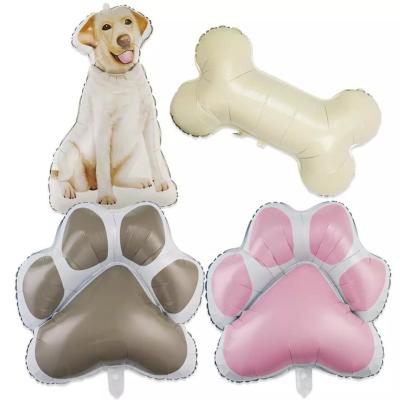 中国 Wholesal新しく大きい犬の足の気球ペット誕生会のためのかわいい犬の漫画のアルミ ホイルの気球の犬用の骨の気球 販売のため