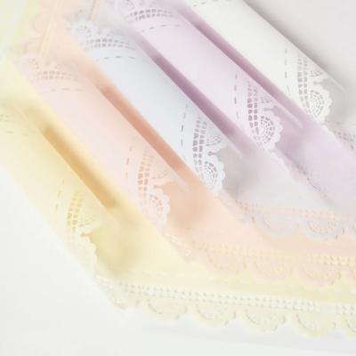 China Lace Border Floral Packaging Paper Plastic Transparent Paper for sale