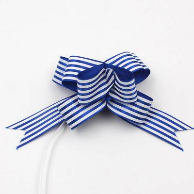 China Printed Pattern Pull 30mm Satin Ribbon Blue Red And White Striped Christmas Bows for sale