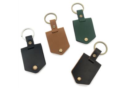 中国 Mini Stand Portable Photo Frame Keychain With Leather Cover Photo Keyring 販売のため