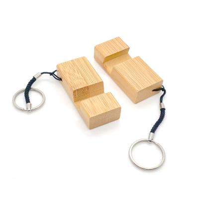 China Handmade Wooden Phone Stand Keychain Multi Functional UV Printing for sale