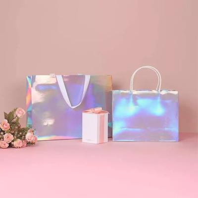 China Glitter Silver Foil Clothing Carrier Bags Holographic Cmyk Color for sale