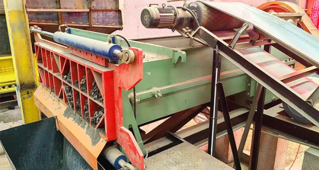Close-up view of extruder structural components