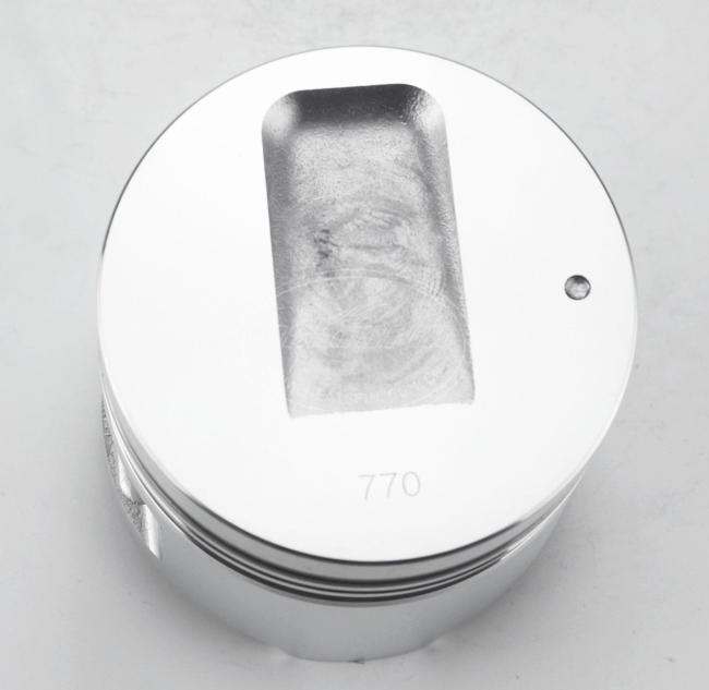 Complete piston assembly showing precision engineering