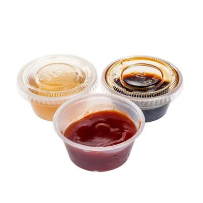 中国 3つのOzふたの食糧ふたが付いているプラスチック香辛料のコップが付いている使い捨て可能なソース コップ 販売のため