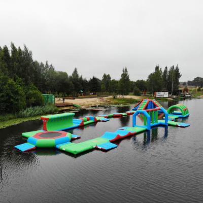China Durable 0.9mm PVC Tarpaulin Inflatable Lake Water Park Green , Blue And Red Color for sale