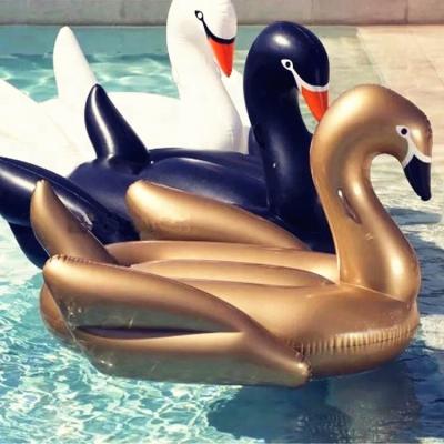 China Unicornio Flamenco balsa de playa inflada lago piscina inflada cisne para adultos en venta