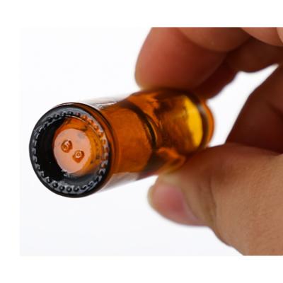 中国 10ml Amber Glass Essential Oil Roller Bottles With Stainless Steel Roller Balls And Caps 販売のため