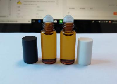 China Modifique el rollo en las botellas de perfume, rollo de cristal del tamaño para requisitos particulares en la botella con la bola de rodillo del metal en venta