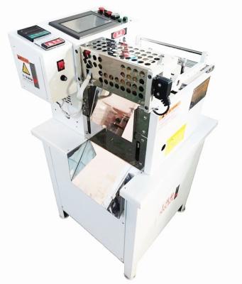China Precisión de corte ± 0,1 mm Máquina de corte de tejido de tubos de cinta de etiqueta en venta