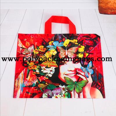 China Multi - Color Printing Die Cut Handle Plastic Shopping Bag for sale