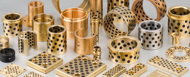 bronze bearings self lubricating plugged graphite bushings