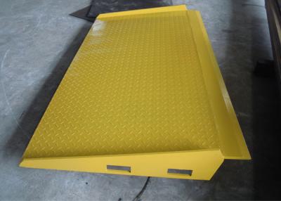 China Yellow Mobile Hydraulic Loading Ramp On Ground Loading And Unloading for sale