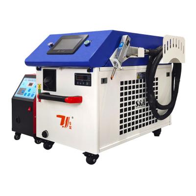 China 2000w 3 Phase Handheld Metal Laser Welding Machine Water Cooling for sale