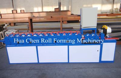 China PLC Control Shutter Door Roll Forming Machine 0.3-0.6mm 15m/Min for sale