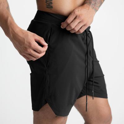 中国 2 In 1 Athletic Training Workout Men Gym Shorts Polyester Double Layer Quick Dry 販売のため