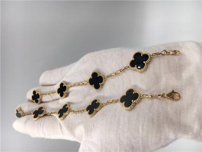 China Vintage Van Cleef Flower Bracelet With 5 Motifs Onyx , 18k Gold Charm Bracelet for sale