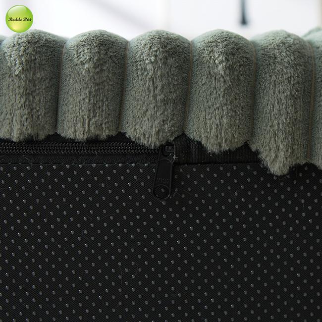 Close-up of armchair fabric and stitching