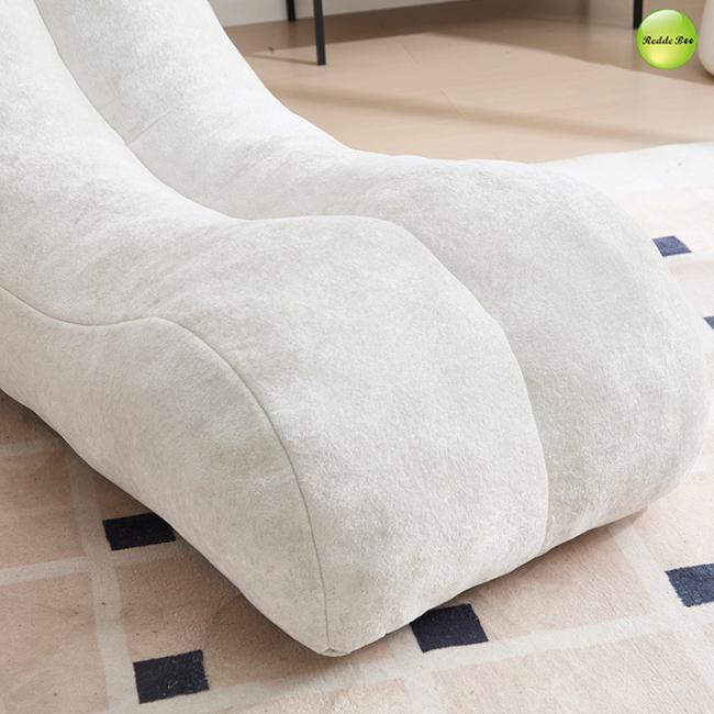 Lounge chair in bedroom setting