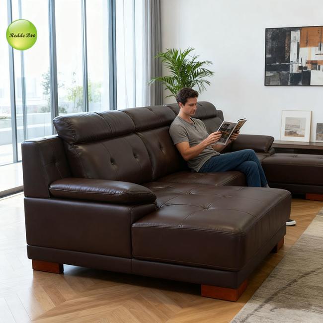 Dark brown leather L-shaped sofa in a modern living room setting