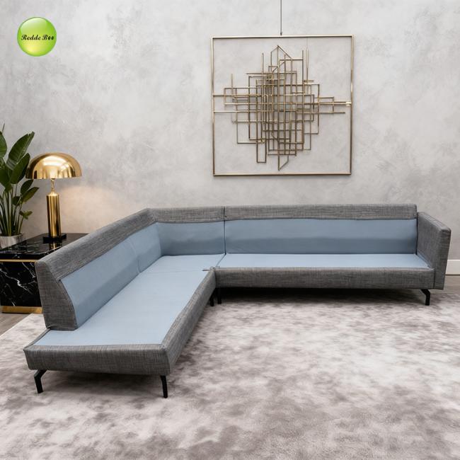 L-shaped sectional sofa configuration in light gray color