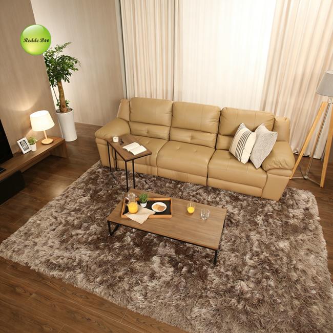 White leather recliner set in reclined position showing full comfort features