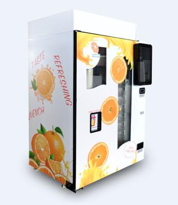 China Auto Coin Operated Freshly Squeezed Orange Juice Vending Machine Refrigeration System for sale