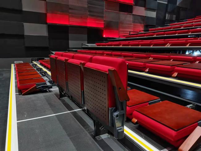 Completed theater chair installation project showing row seating