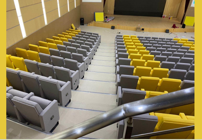 Theater seating installation project with multiple rows in a modern cinema