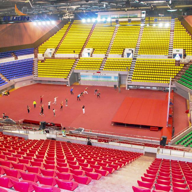 Flyon Plastic Stadium Seating product display showing various colors and styles