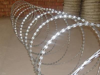 China Bto 22 Cbt 60 Galvanized Flat Wrap Razor Wire For Walls And Existing Fences for sale