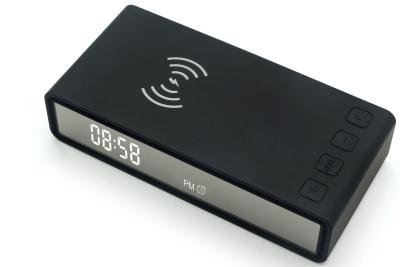 China 10000mAh wireless power bank with Alarm Clock, showing temperature, time, alarm and capacity level for sale