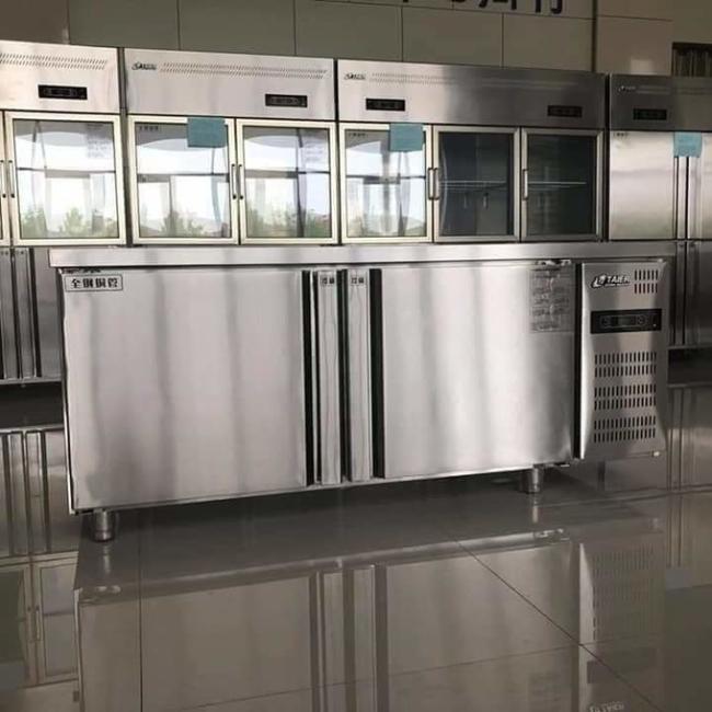 Stainless steel commercial refrigerator workbench in the back kitchen of hotel restaurant 0