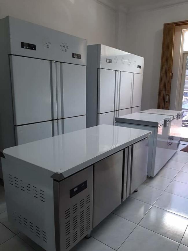 Stainless steel commercial refrigerator workbench in the back kitchen of hotel restaurant 4
