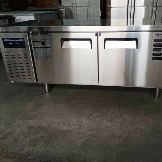Stainless steel commercial refrigerator workbench in the back kitchen of hotel restaurant 9