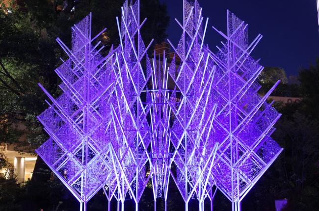 Steel acrylic sculpture in landscape setting