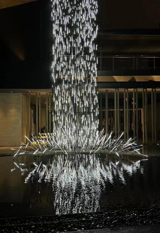 Stainless steel acrylic LED sculpture close-up detail