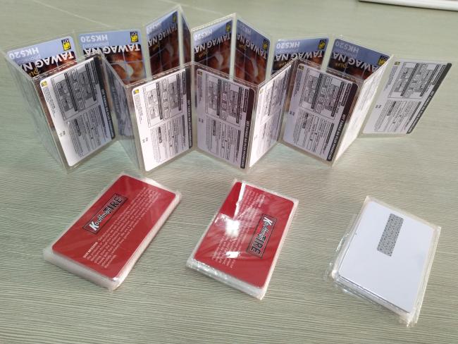 Finished packaged cards showing clean ultrasonic seals